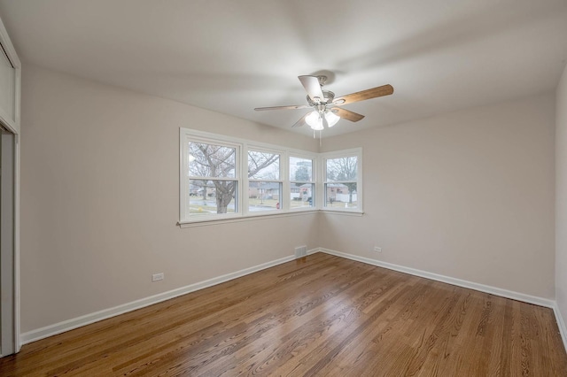 unfurnished bedroom with hardwood / wood-style flooring and ceiling fan