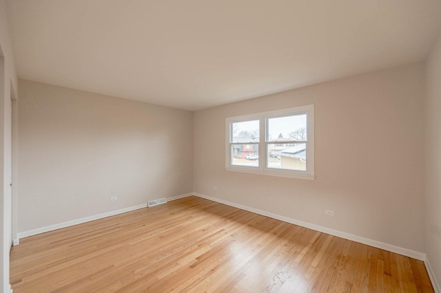 empty room featuring light hardwood / wood-style floors