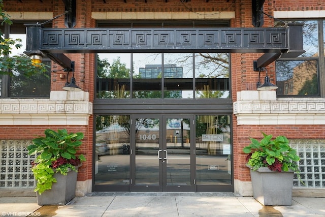 property entrance featuring french doors