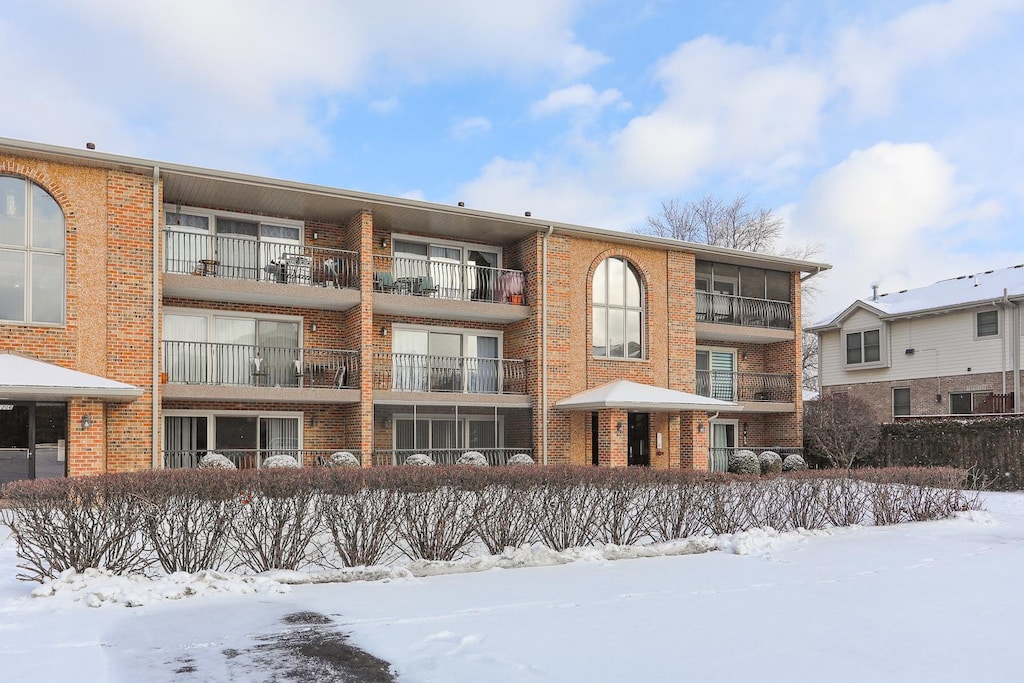 view of snow covered property