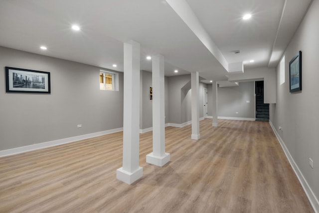 basement with light wood-type flooring