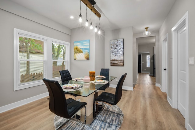 dining room with light hardwood / wood-style floors