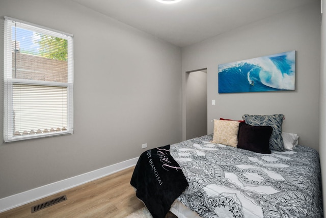 bedroom featuring light hardwood / wood-style flooring