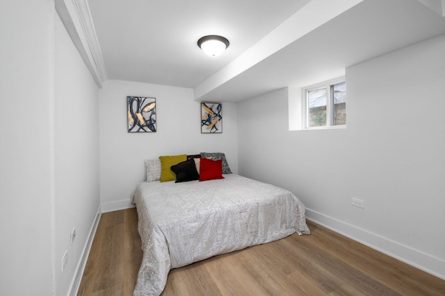 bedroom featuring wood-type flooring