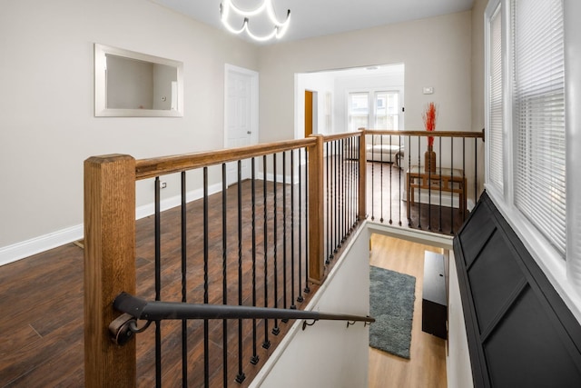 stairway featuring wood-type flooring