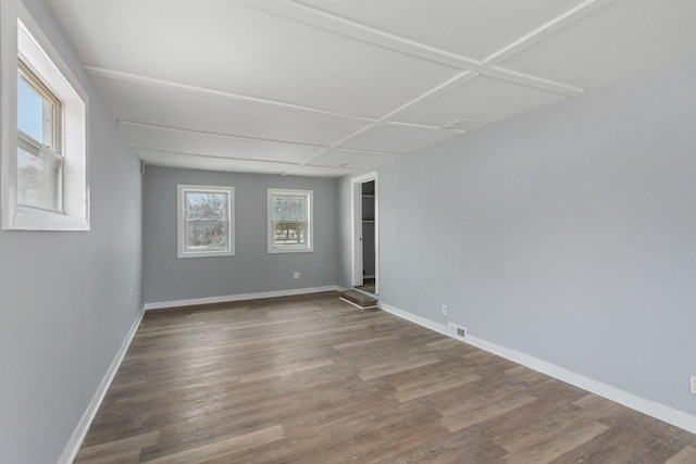 unfurnished room featuring wood-type flooring