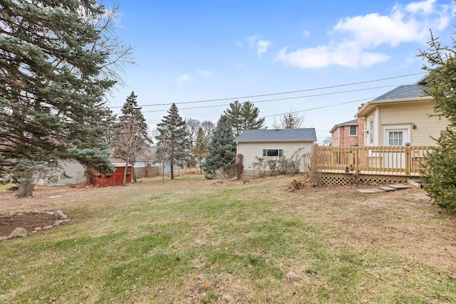 view of yard featuring a wooden deck