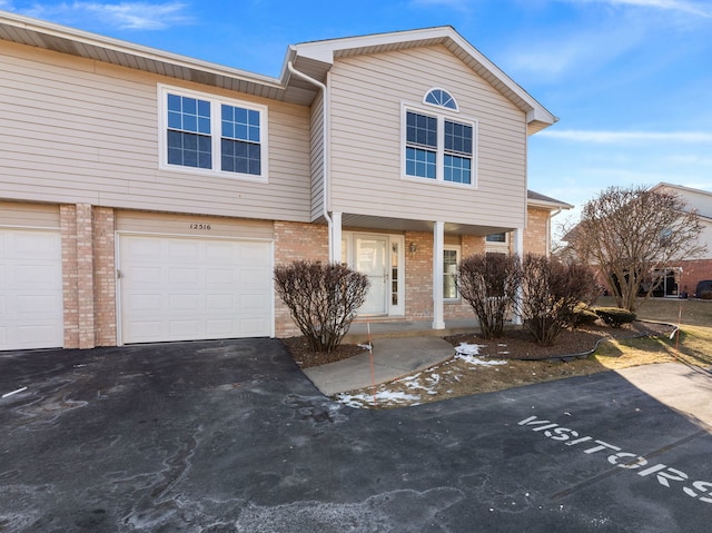 view of property featuring a garage