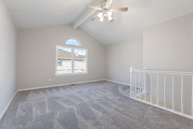 carpeted empty room with ceiling fan and lofted ceiling with beams