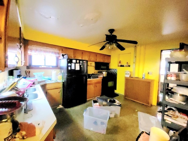 kitchen with black appliances and ceiling fan