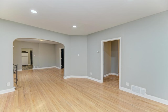 unfurnished room featuring light hardwood / wood-style flooring