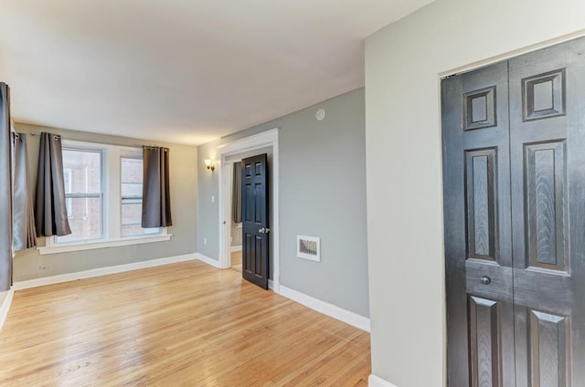 empty room featuring light hardwood / wood-style flooring