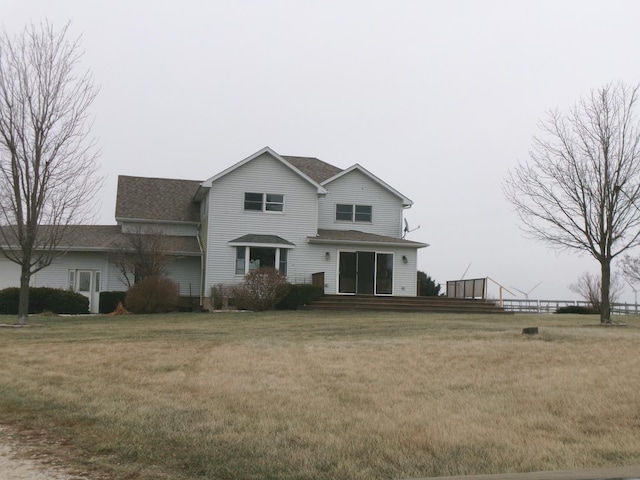 view of front of home featuring a front lawn