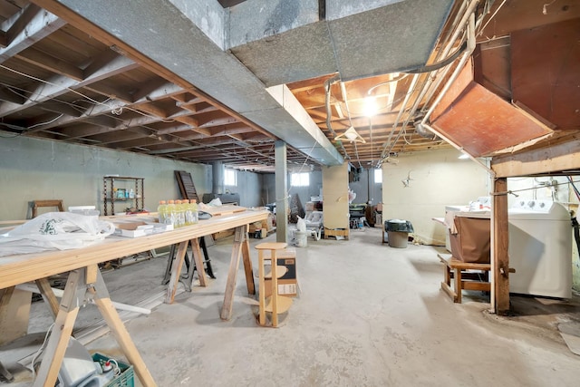 basement featuring washer and clothes dryer