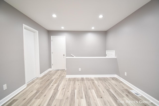 empty room featuring light hardwood / wood-style floors