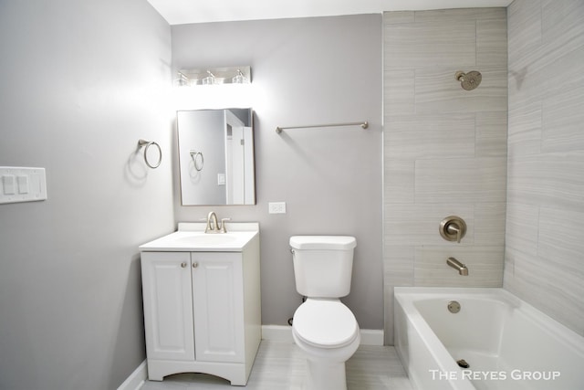 full bathroom featuring vanity, toilet, and tiled shower / bath combo