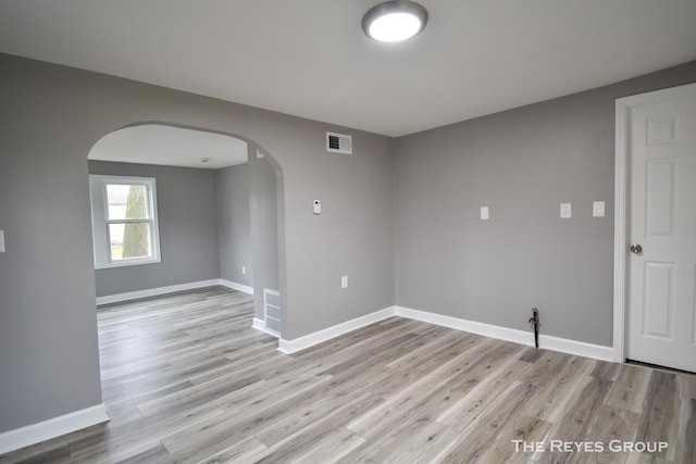 empty room with light wood-type flooring