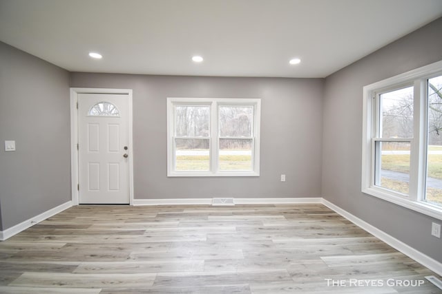 foyer featuring light wood-type flooring