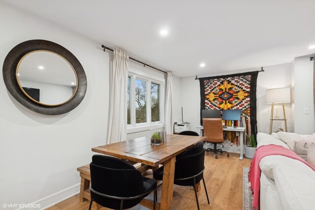 dining space featuring light hardwood / wood-style floors