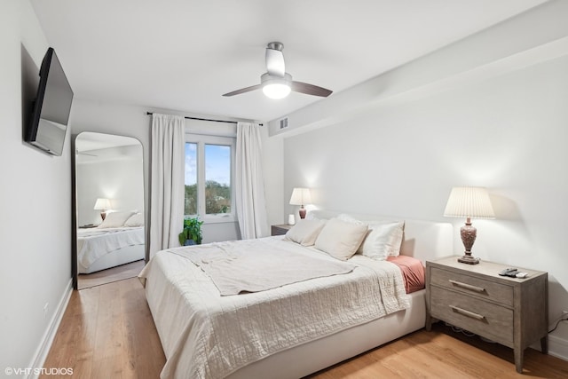 bedroom featuring ceiling fan and light wood-type flooring