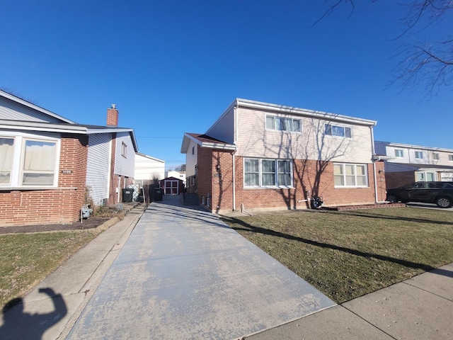 view of front of property with a front lawn