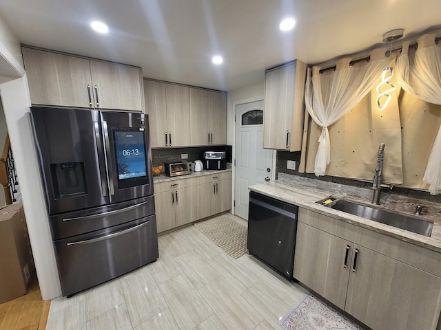 kitchen with decorative backsplash, sink, light brown cabinets, dishwasher, and stainless steel fridge with ice dispenser