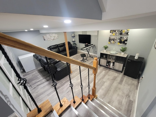 stairs with wood-type flooring