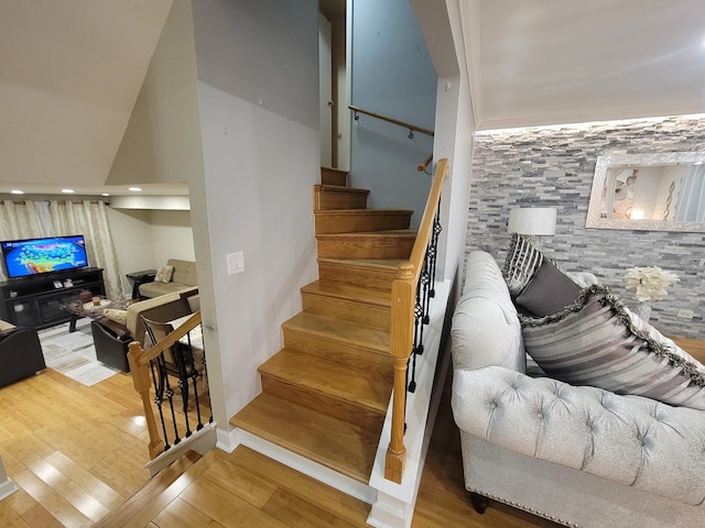 stairway featuring hardwood / wood-style floors