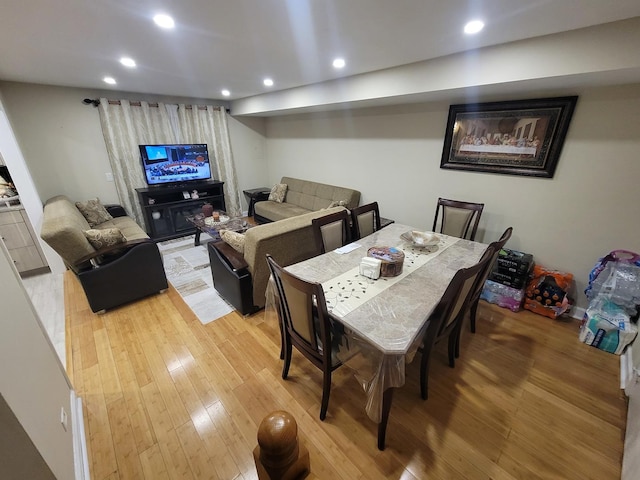 dining space featuring light hardwood / wood-style floors