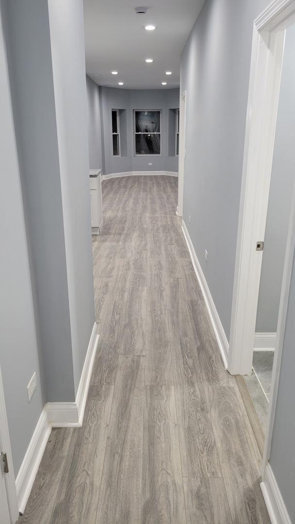 1918 S Kedzie Ave, Chicago, IL 60623 - corridor featuring wood finished floors and baseboards