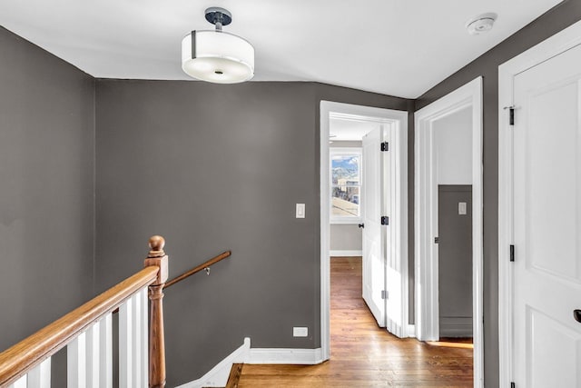 hall with light hardwood / wood-style flooring