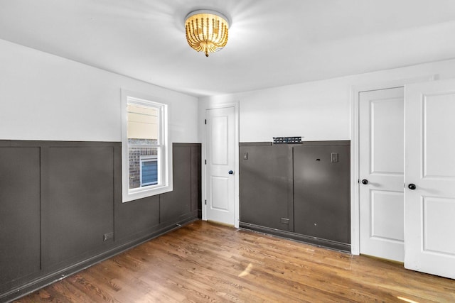 empty room featuring hardwood / wood-style flooring