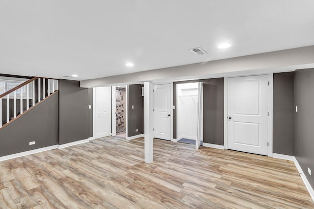 basement with light wood-type flooring