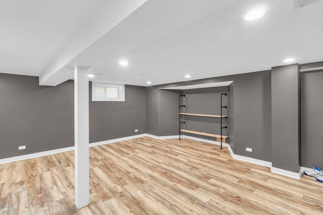 basement featuring light wood-type flooring