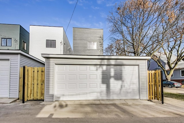 garage with fence