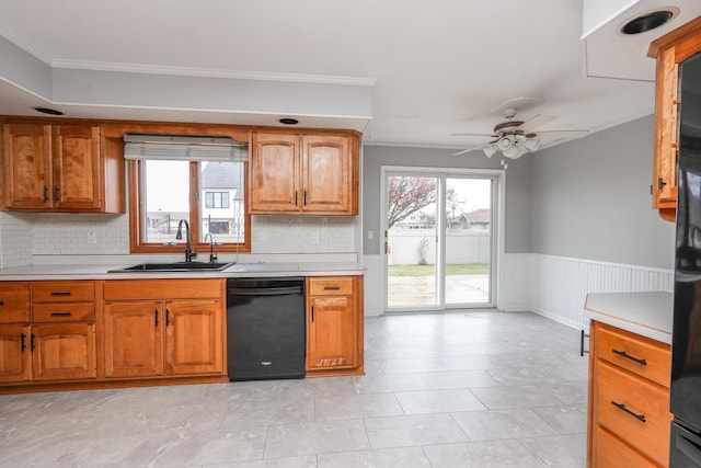 kitchen with dishwasher, sink, crown molding, ceiling fan, and tasteful backsplash