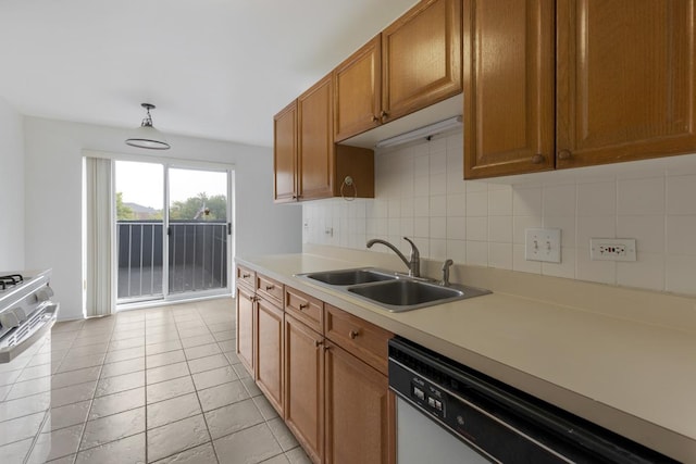 kitchen featuring decorative backsplash, sink, light tile patterned floors, dishwasher, and range