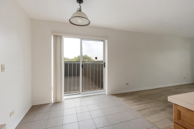 interior space featuring light tile patterned floors