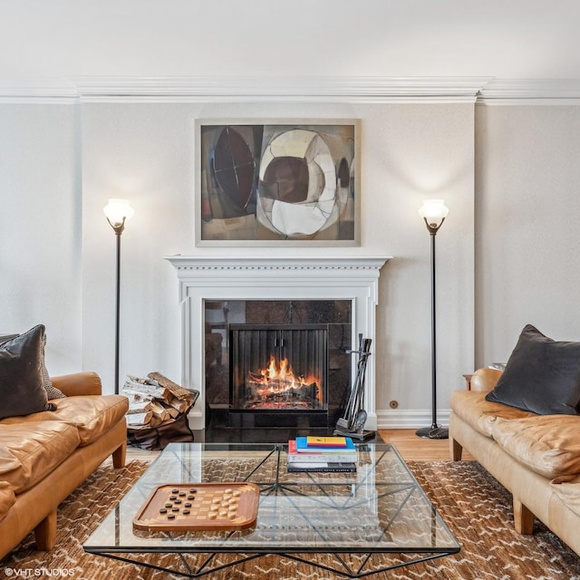 living room featuring wood-type flooring and crown molding