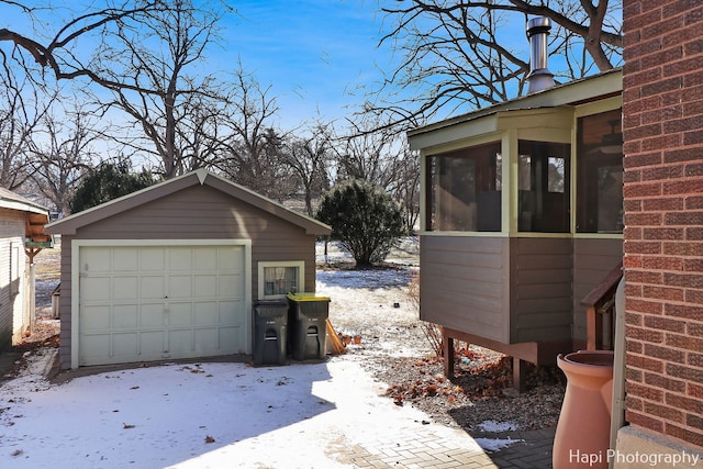 exterior space featuring an outdoor structure and a garage