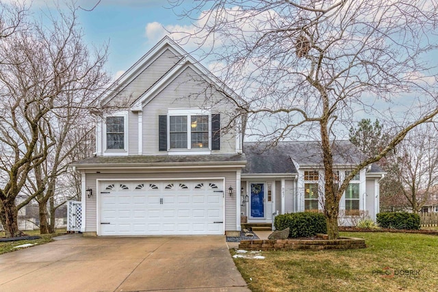 view of front property with a front yard and a garage