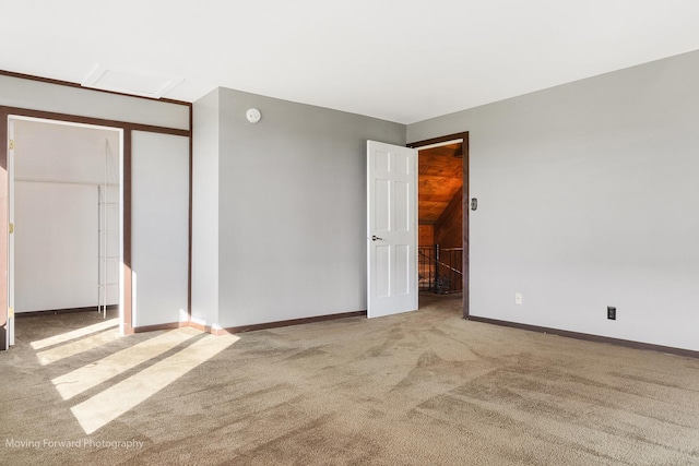 unfurnished bedroom featuring a closet and carpet floors