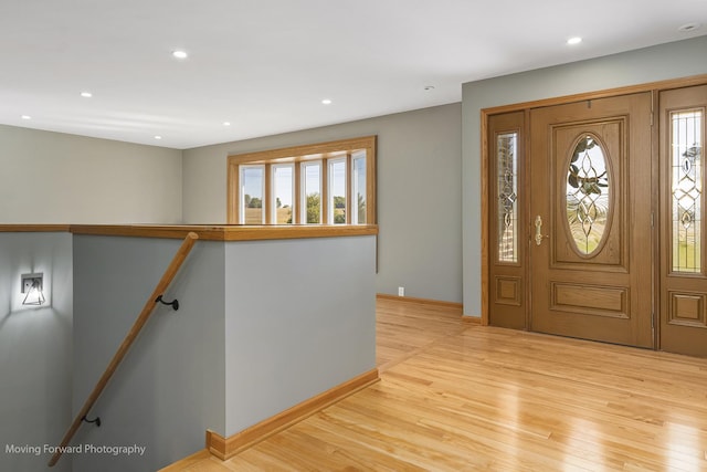 entryway with light hardwood / wood-style flooring