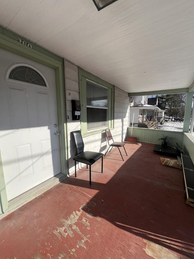 view of patio featuring a porch