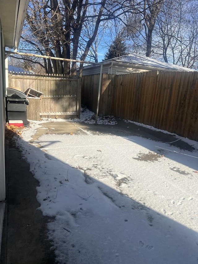 view of yard covered in snow