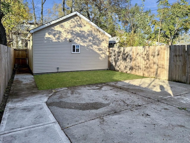 exterior space with a patio area and an outdoor structure