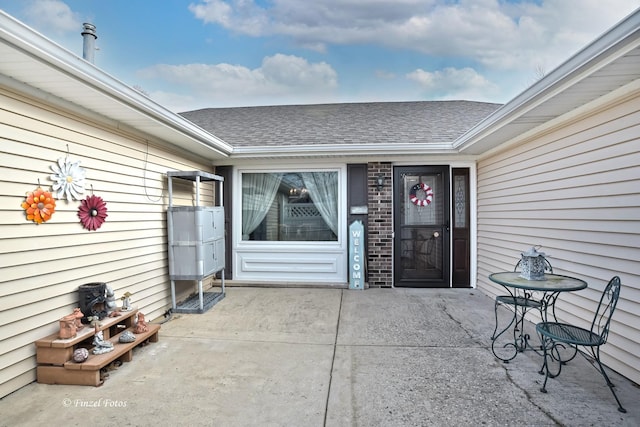 entrance to property with a patio