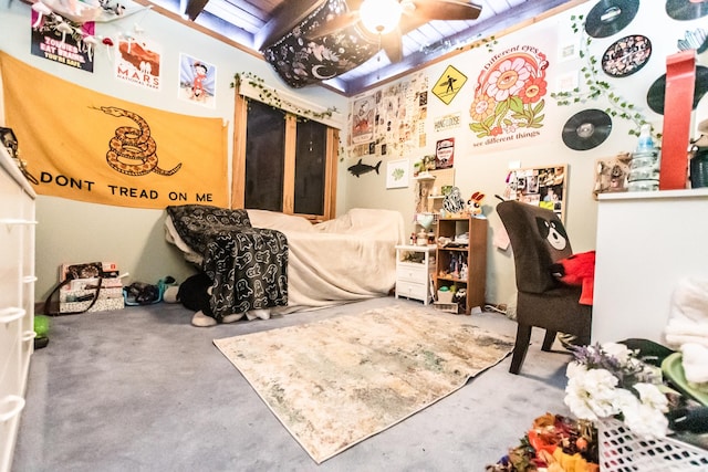 bedroom with ceiling fan and concrete floors