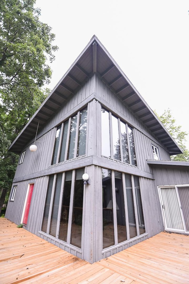 view of side of home featuring a deck