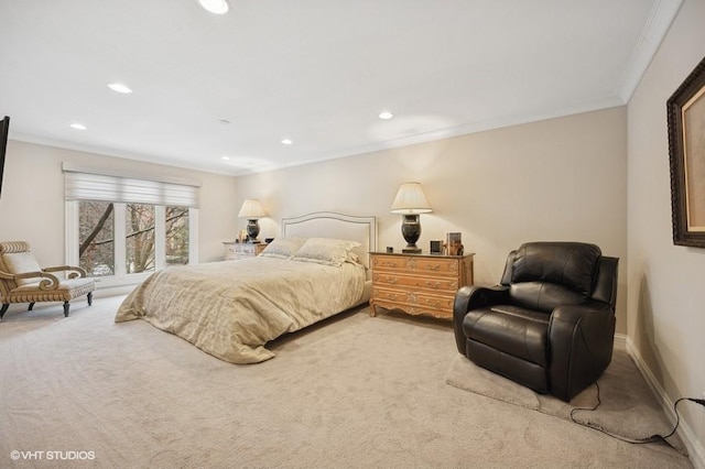 bedroom featuring crown molding and carpet